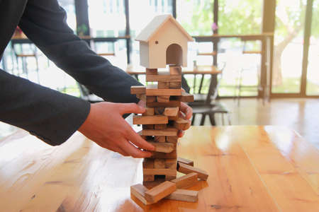 Real estate planning and financial investment risk prevention, prevent the risk of the house.plan and strategy in business.の写真素材