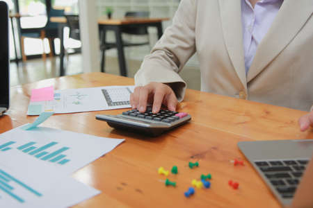 Businessman using office annual balance display calculator.accounting concept.の写真素材