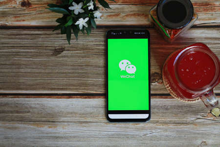 CHIANG MAI, THAILAND - August 11, 2020 : Mobile phone with WeChat app on the screen.WeChat is a Chinese multi-purpose messaging, social media and mobile payment appのeditorial素材
