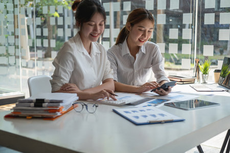 Marketing, Financial, Accounting, Planning, Casual meeting of smiling diverse business team analyzing financial data, Planning Concept.の写真素材