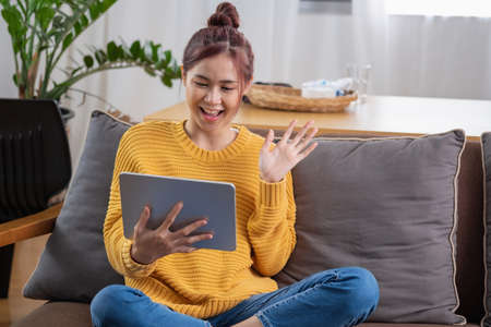 Young Asian SME businessman starting a small and boxed SME business as an online business. Online SME business concept.の写真素材