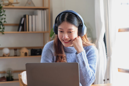 relax, de-stress, holiday, happy, Asian woman relaxing at home listening to music from smartphone...