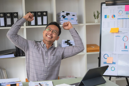 Marketing, Financial, Accounting, Planning, business man expresses his joy at making annual profits for a successful company.の写真素材