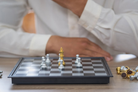 Businessman planning a chess walk Entrepreneurs are planning their businesses to compete with their competitors in marketing.の写真素材