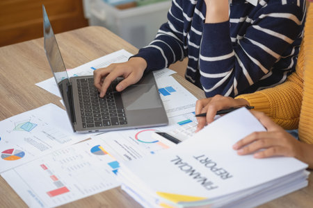 Marketing, Finance, Accounting, Planning, Team female accountant using laptop calculator and...