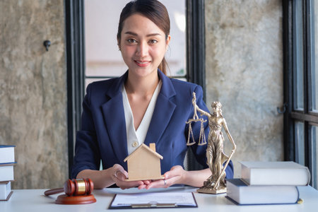 Law, Counsel, Agreement, Contract, Lawyer, Advising on litigation matters and signing contracts as a lawyer to receive home and land mortgage complaints from customers. concept lawyerの写真素材