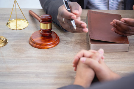 Law Consulting, Agreements, Contracts, African American attorneys provide legal advice and sign contracts as grievance attorneys for clients, Concept lawyers.の写真素材