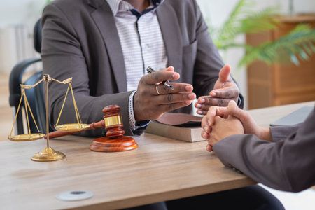 Law Consulting, Agreements, Contracts, African American attorneys provide legal advice and sign contracts as grievance attorneys for clients, Concept lawyers.の写真素材