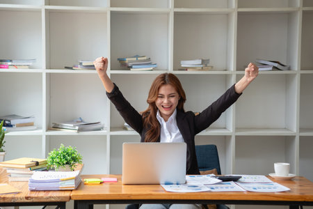 Business, finance and employment, female successful entrepreneurs concept. Confident smiling Asian businesswoman, using a laptop at workの写真素材