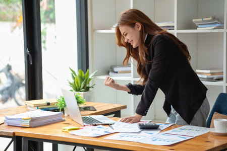 Business, finance and employment, female successful entrepreneurs concept. Confident smiling Asian businesswoman, using a laptop at workの写真素材