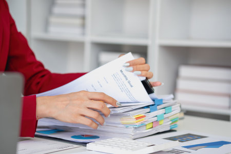 planning, auditing, business planning, finance, young asian business woman working on computer and checking investment documents and planning marketing to increase profit, business conceptsの写真素材