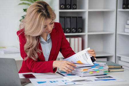 planning, auditing, business planning, finance, young asian business woman working on computer and checking investment documents and planning marketing to increase profit, business conceptsの写真素材