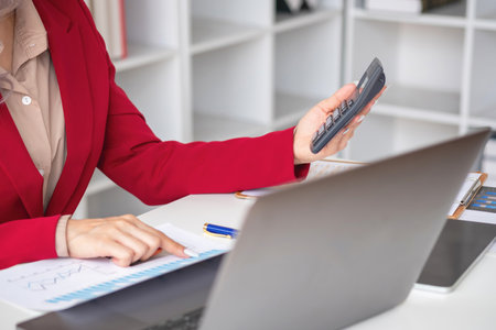 planning, auditing, business planning, finance, young asian business woman working on computer and checking investment documents and planning marketing to increase profit, business conceptsの写真素材