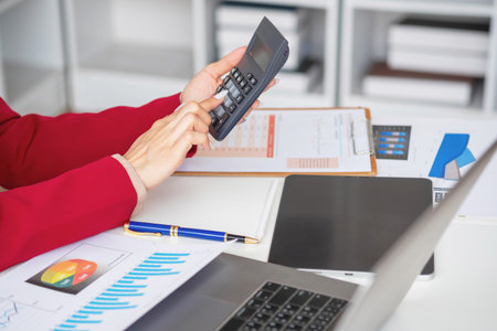 planning, auditing, business planning, finance, young asian business woman working on computer and checking investment documents and planning marketing to increase profit, business conceptsの写真素材