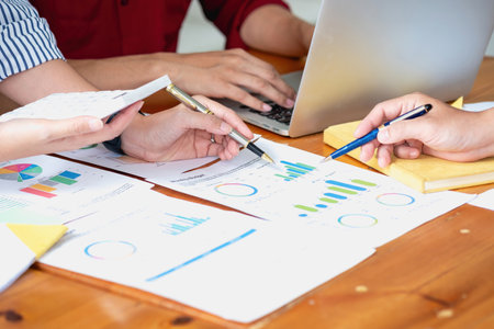 Planning to reduce investment risks, The business team is planning to adjust the marketing strategy to make the company profitable and analyze the investment for customers within the company.の写真素材