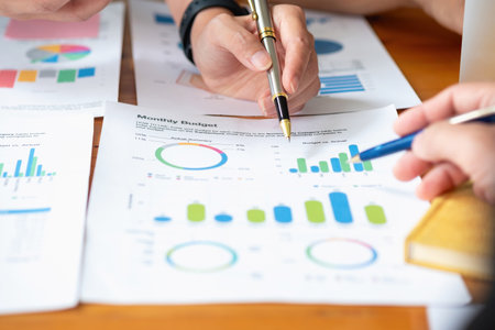 Planning to reduce investment risks, The business team is planning to adjust the marketing strategy to make the company profitable and analyze the investment for customers within the company.の写真素材