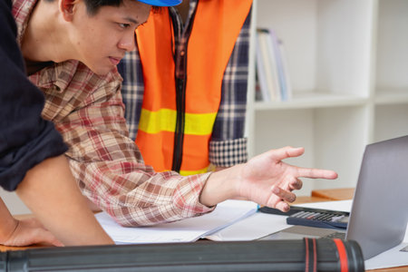 Concept meeting engineers or architects for projects working with partners and engineering tools to create models and blueprints at the job site. construction concept. Engineer concept.の写真素材