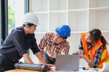 Concept meeting engineers or architects for projects working with partners and engineering tools to create models and blueprints at the job site. construction concept. Engineer concept.の写真素材