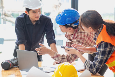 Concept meeting engineers or architects for projects working with partners and engineering tools to create models and blueprints at the job site. construction concept. Engineer concept.の写真素材