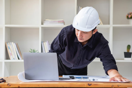 Concept meeting engineers or architects for projects working with partners and engineering tools to create models and blueprints at the job site. construction concept. Engineer concept.の写真素材