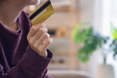 Beautiful Asian women using credit cards for shopping online with laptops and smartphones, online shopping portrait concept.の写真素材