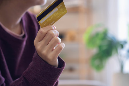 Beautiful Asian women using credit cards for shopping online with laptops and smartphones, online shopping portrait concept.の写真素材
