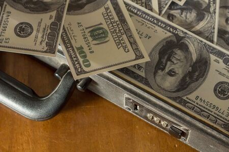 Still life briefcase and money insideの写真素材