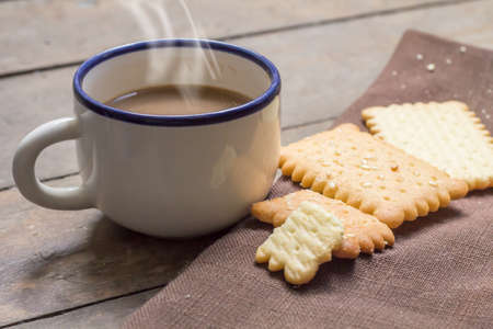Hot coffee with crackers の写真素材
