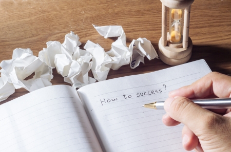 How to success, writing message on book 
