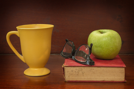 Coffee and apple for reading の写真素材