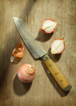 Shallot with kitchen knife の写真素材