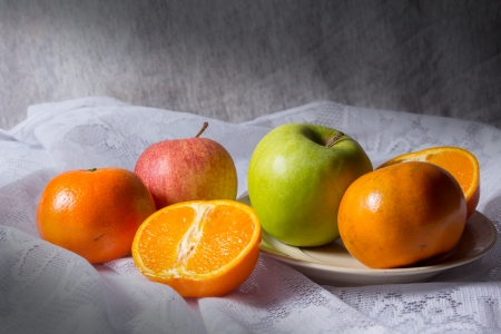 Still life combination fruits,green and red apple with orange の写真素材