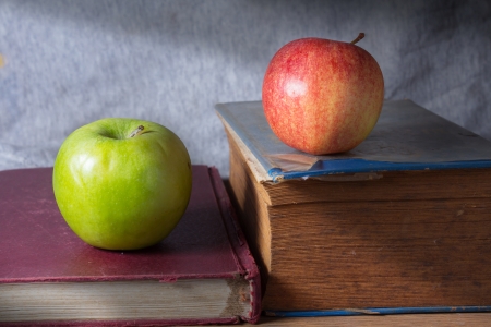 Apples with antique books の写真素材