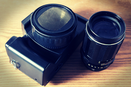 Old camera with manual focus lens,vintage light の写真素材