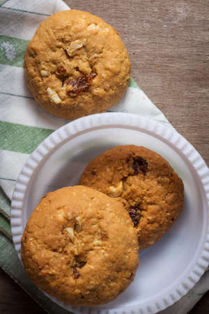 Cookies on table cloth top view.