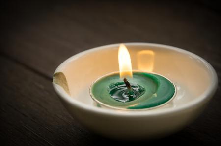 Still life Candle on broken bow.の写真素材