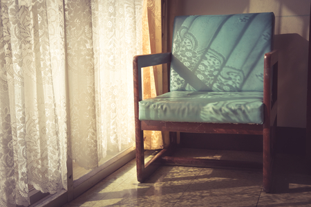 Vintage color filtered armchair,interior concept.の写真素材