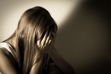 Monochrome filtered of sad girl,social problem concept.の写真素材