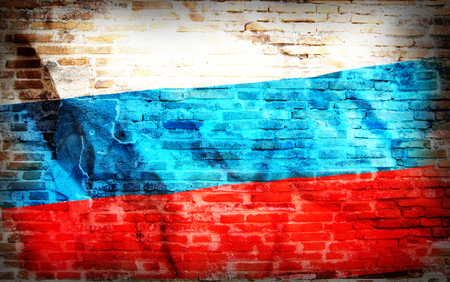 Vintage grunge filtered,Russia national flag on brick.の写真素材