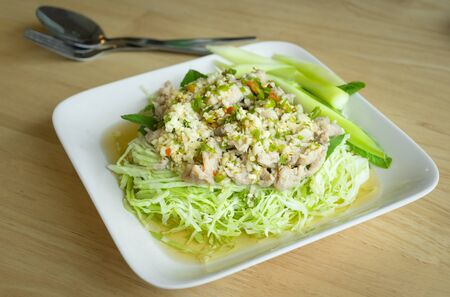 Boiled pork with lime,garlic and chili sauce.の写真素材