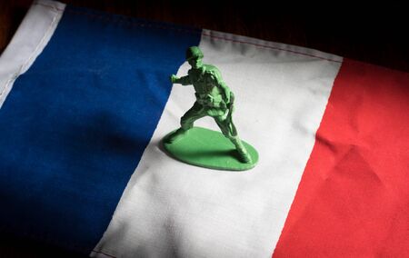 Soldiers toys on France national flag.の写真素材