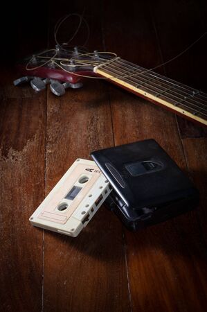 Cassette tape with audio player and guitar,music concept.の写真素材
