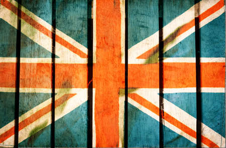 Vintage grunge filtered,United Kingdom national flag on wood backgroundの写真素材