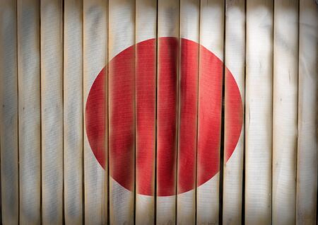 Japan national flag on bamboo wood,background.
