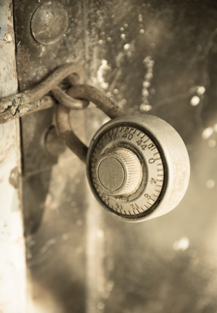 Old metal door lock and key,vintage filtered.の写真素材