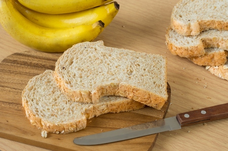 Whole wheat breads with banana on board.