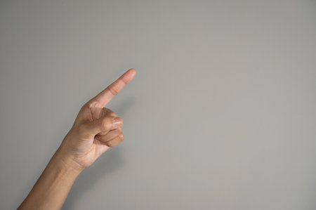 Woman hand pointing fingers,concept idea.の写真素材