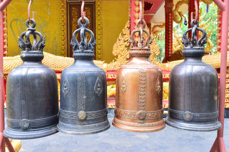 a church bell is a beautiful art in the temple of Thailandの写真素材