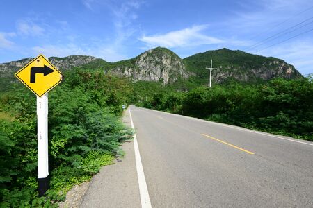 Traffic signs at the side of the road in Thailand.の写真素材