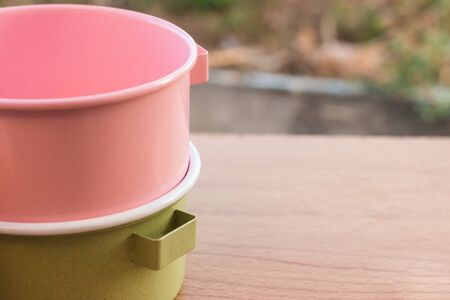 Food carrier colorful on a woodenの写真素材